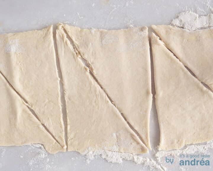 Cut the dough into triangles.