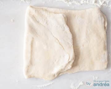 Fold ⅓ of the dough inwards.