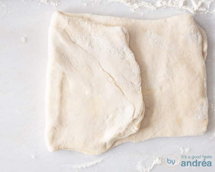 Fold 1/3 of the dough inwards.