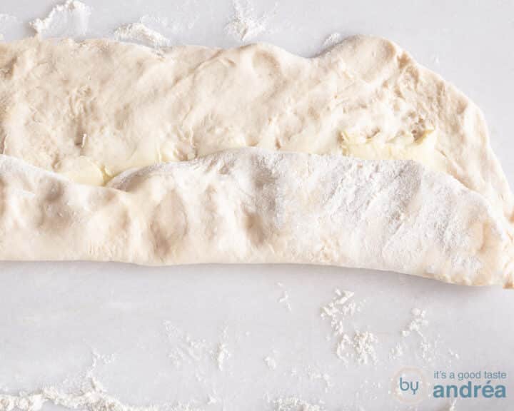 Fold 1/3 of the dough inwards.