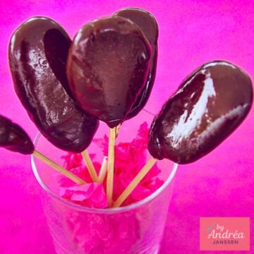 Toffee Lollipops Homemade Candy on a pink background
