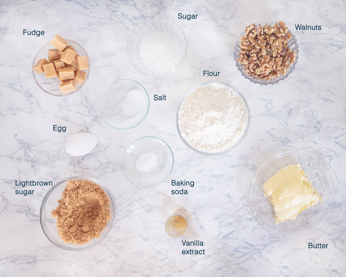 Ingredients Walnut Cookies with Fudge with white marble background and text description