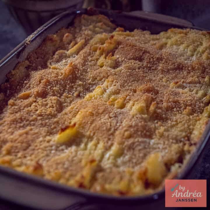 A square photo with a sauerkraut and minced meat casserole with mashed potatoes on top.