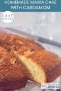 A part of a Mawa Cake with cardamom and cashew nuts. A point is cut out. A text at the top: easy recipe, Indian Mawa Cake