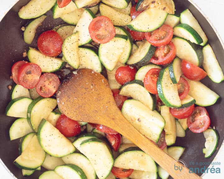 Zucchini, tomatoes stir-fried and seasoned with herbs.