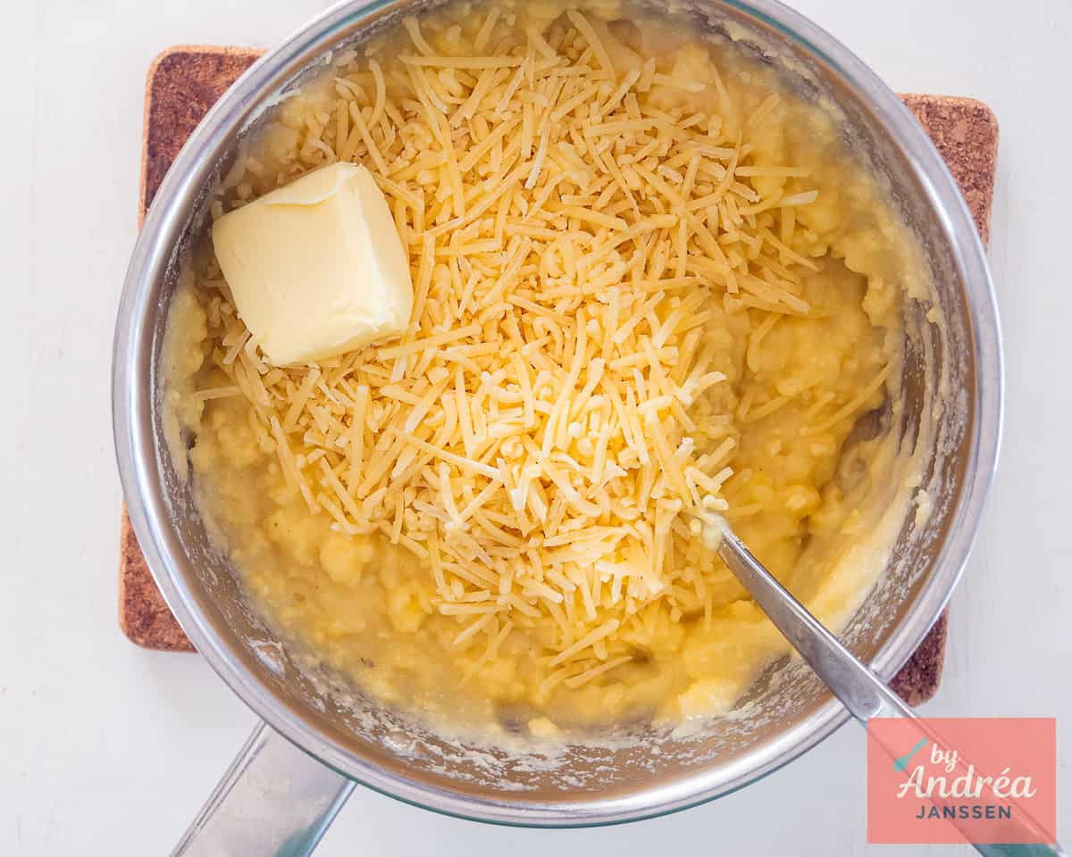 Polenta with butter and cheese in a saucepan