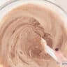 Mix the whipped cream with the chocolate mixture in a glass bowl