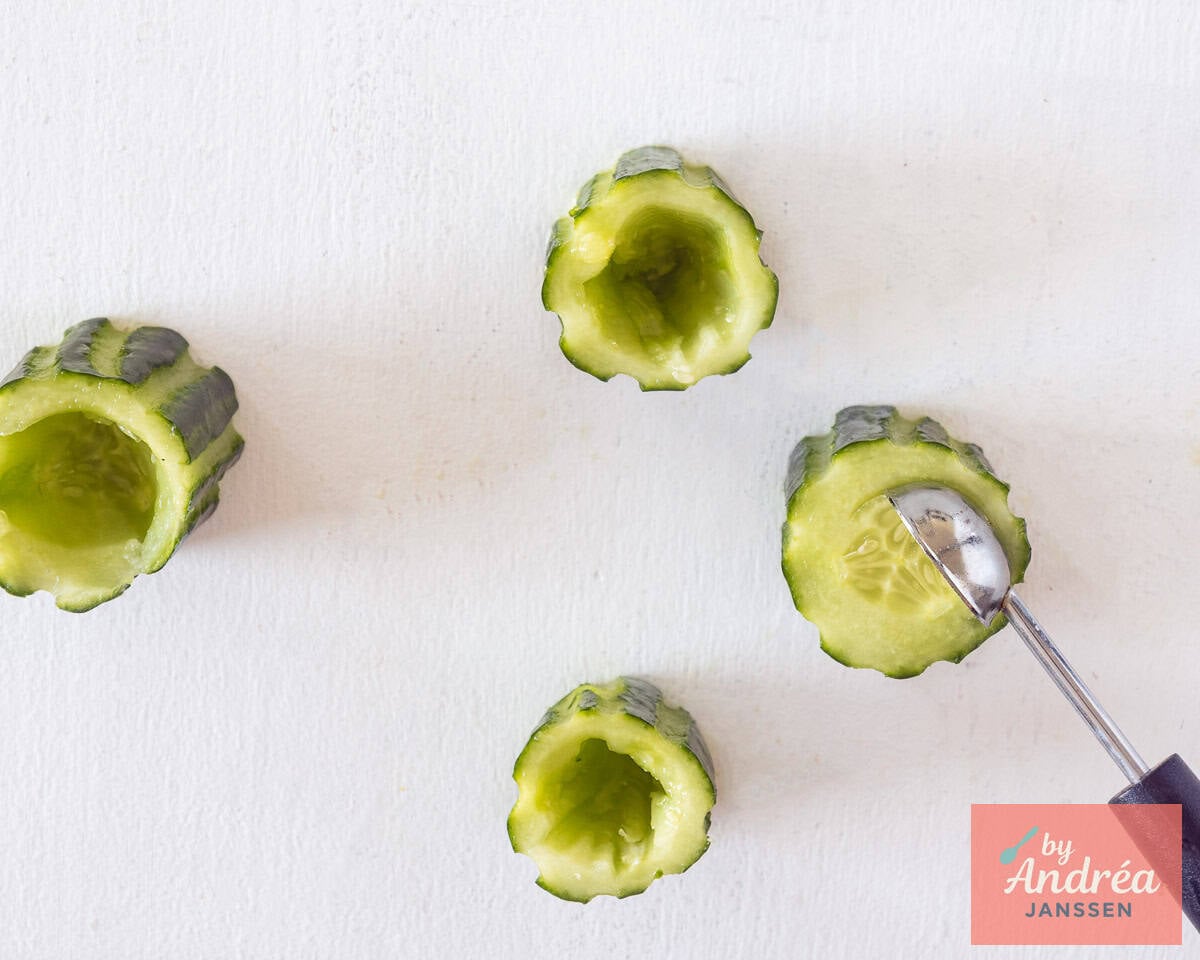Hollow out the cucumber with a melon baller.