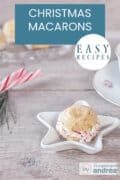 A star-shaped bowl with a macaron with candy canes for Christmas. A wooden surface. A text at the top: easy recipe, Christmas macarons