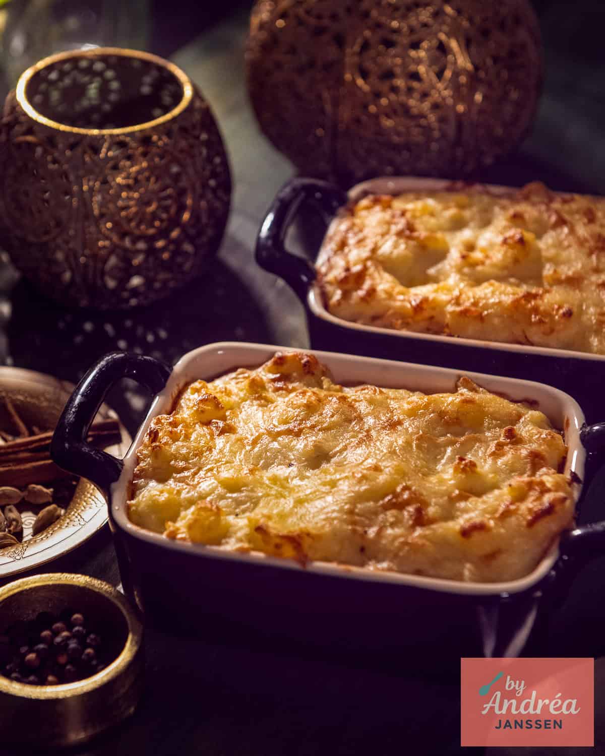 Two curried sauerkraut casseroles on a black background