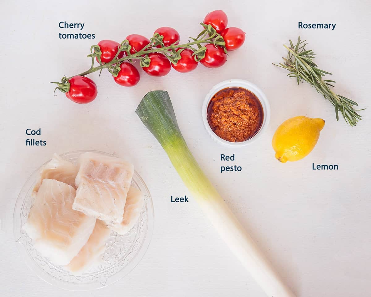 Ingredients Baked Cod in Foil Packets with Pesto on a white background with text description