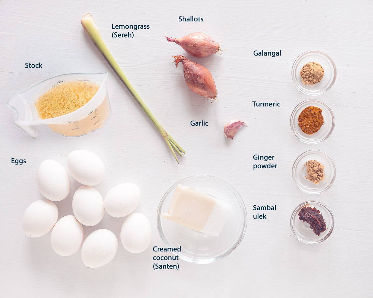 Ingredients Indonesian Eggs in Coconut Sauce with Lemongrass and Sambal on a white background with text description