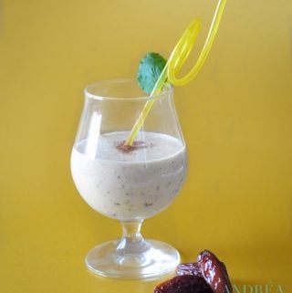 mango coconut smoothie in a cocktail glass