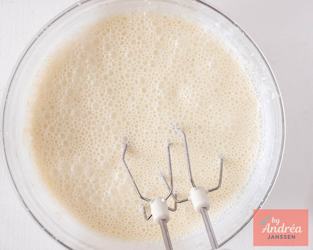 Whisking cold white chocolate ice cream base