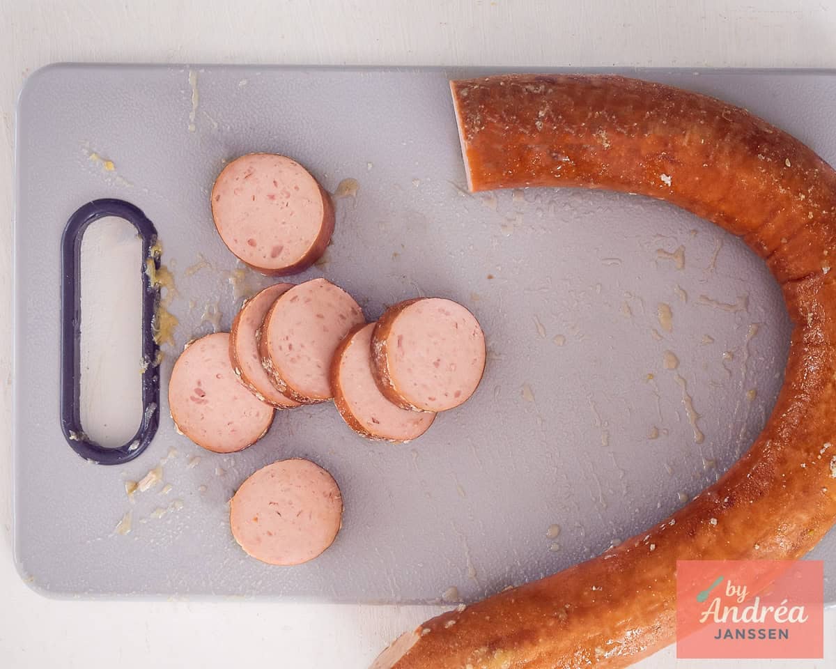 Cooked smoked sausage that is cut into slices
