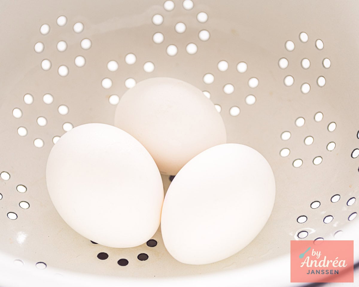 Hard-boiled eggs in a colander
