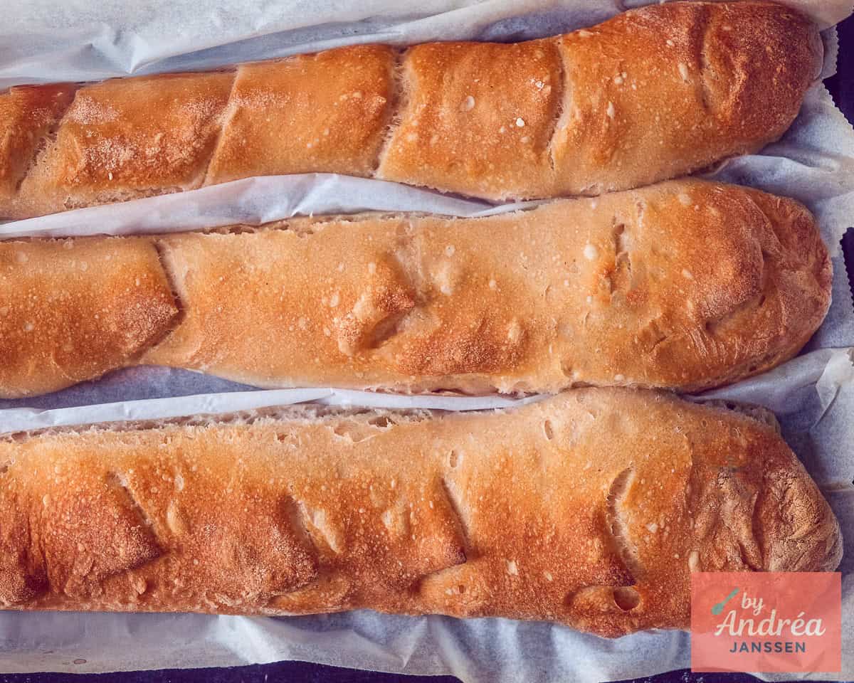 Bake the baguettes in the oven until done.