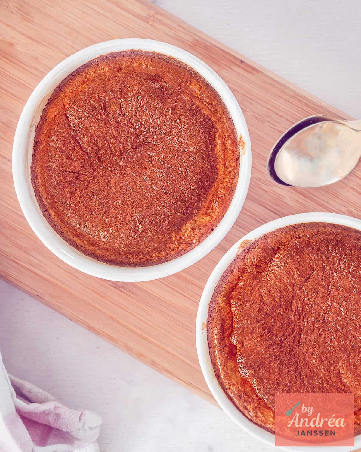 A photo from above of two small oven dishes with Jerusalem artichoke soufflé