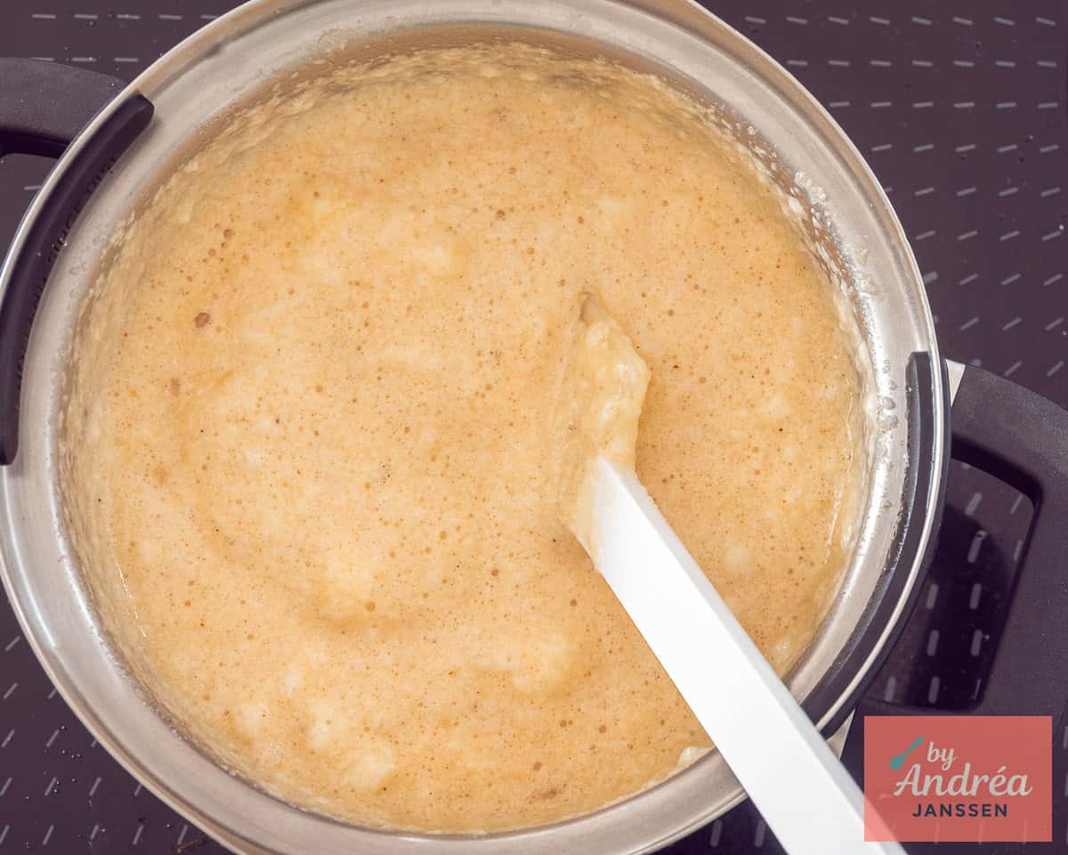 Gently mix stiffly beaten egg white into the soufflé