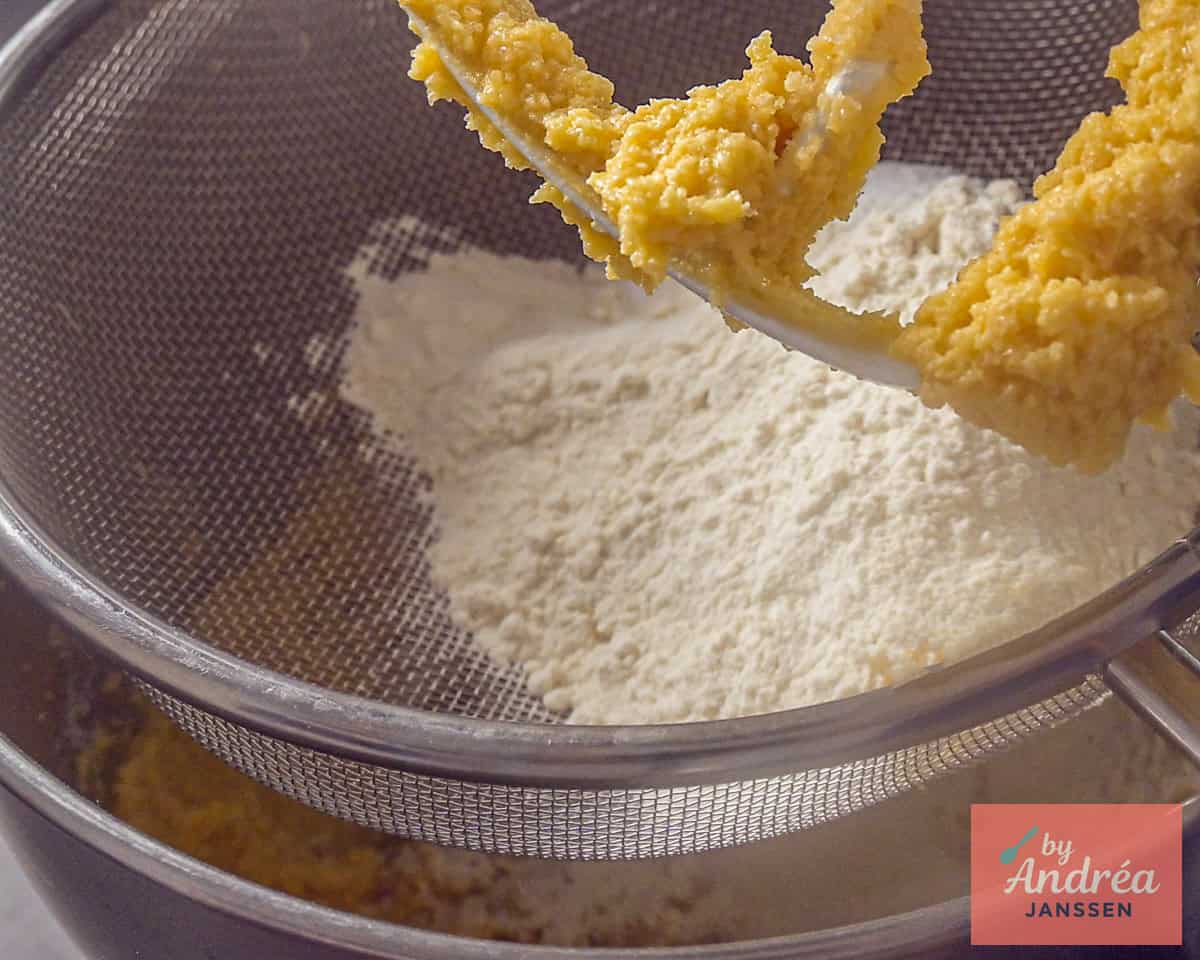 Sift flour, baking powder, and salt into the batter.