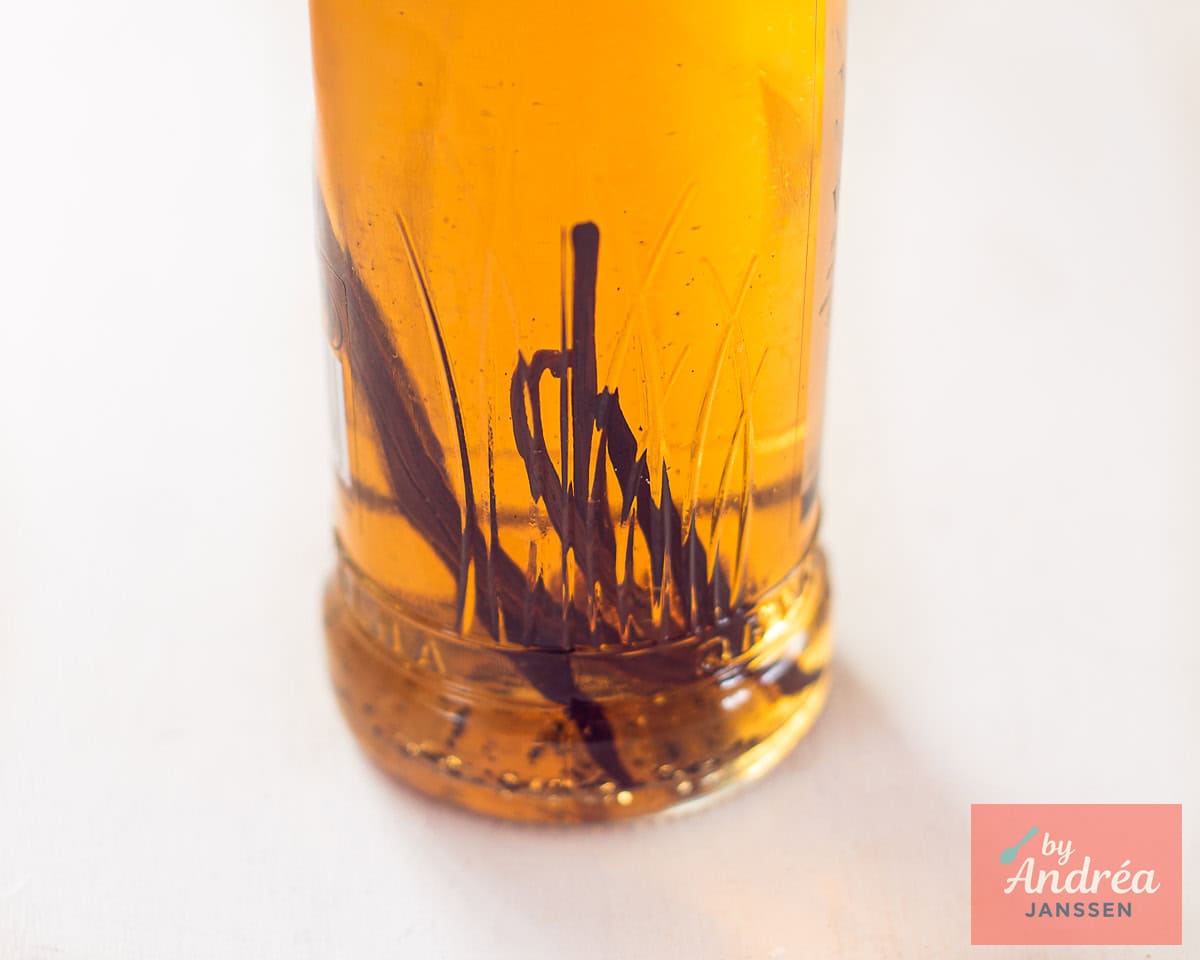 A bottle with vanilla pods and vodka after a few weeks.