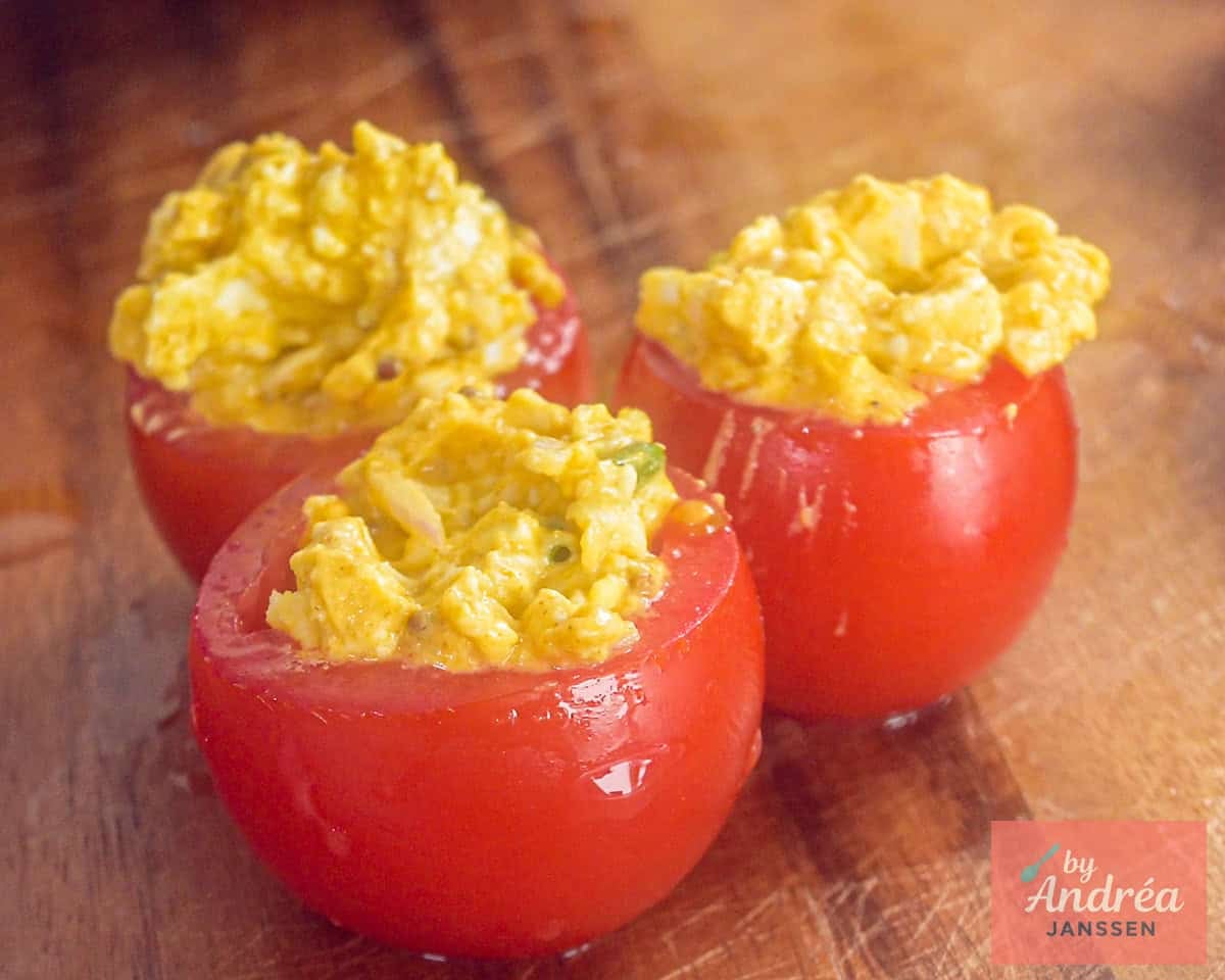 Hollowed cherry tomatoes filled with egg salad