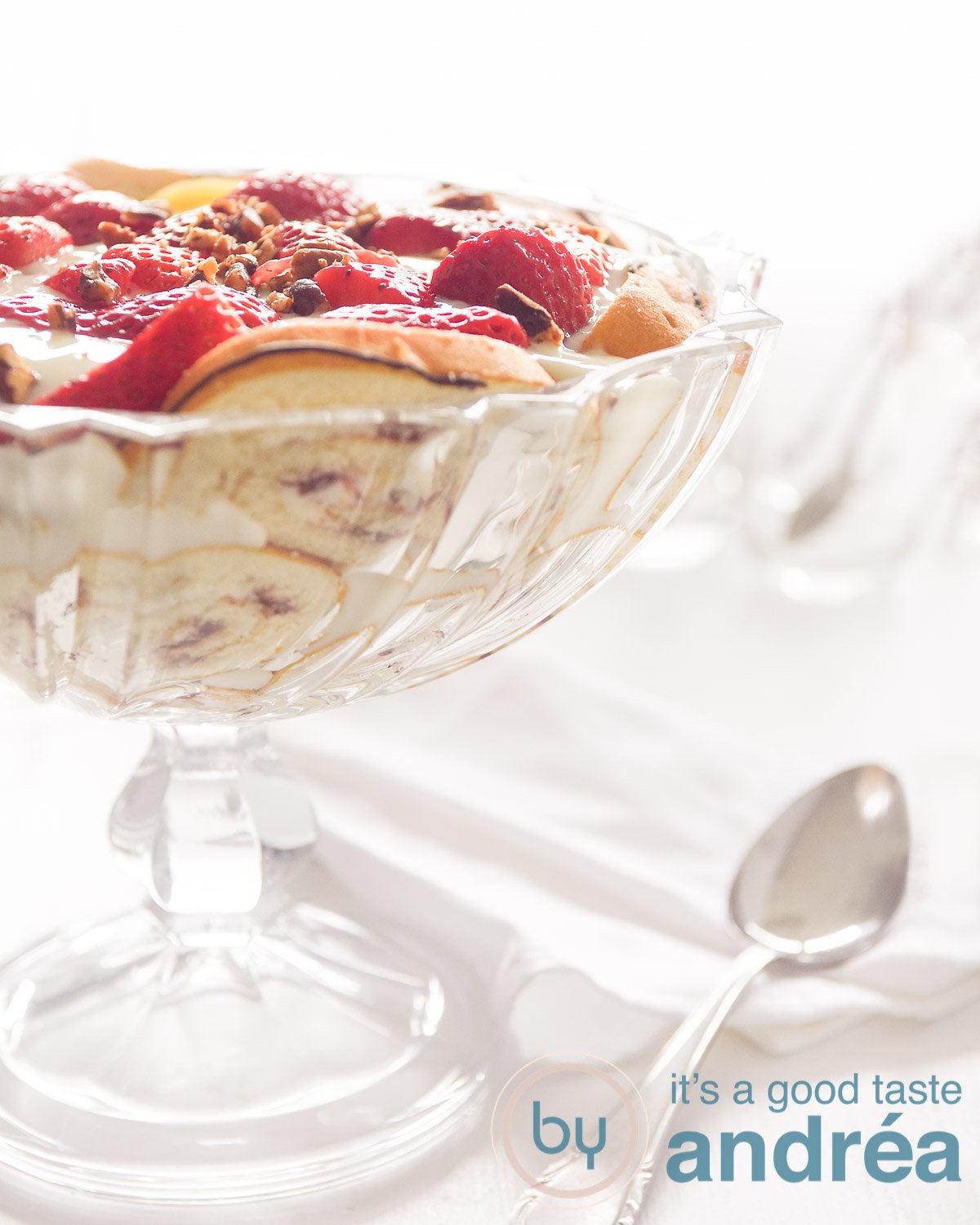 a bowl with strawberry trifle