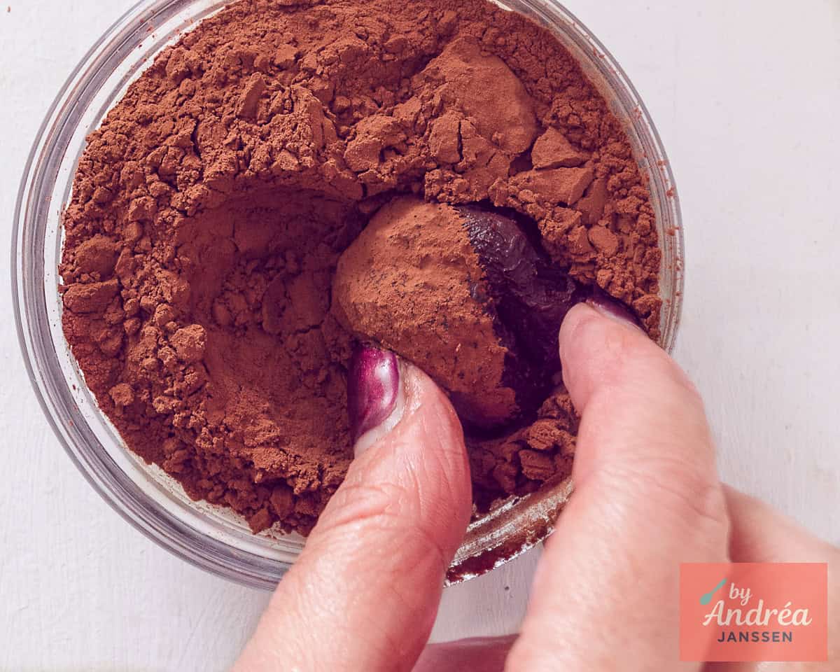 Roll the truffles in the cocoa.