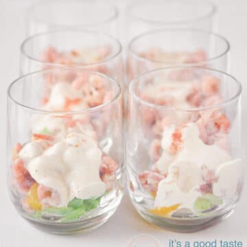 six glasses with shrimp cocktail