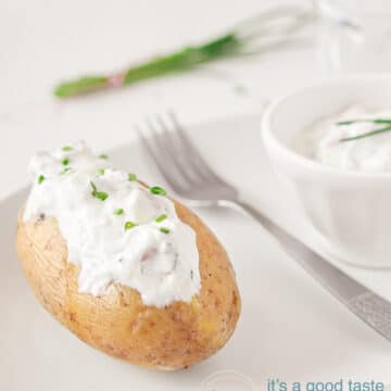 baked potato with herbed cottage cheese on a plate