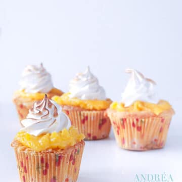 4 Lemon meringue cupcakes on a white plate