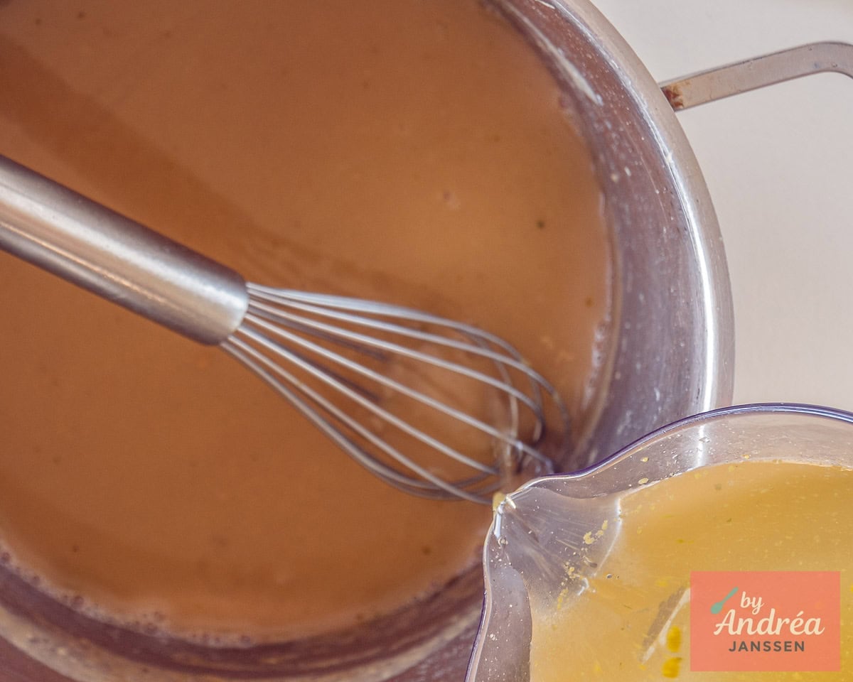 Pour broth into the roux