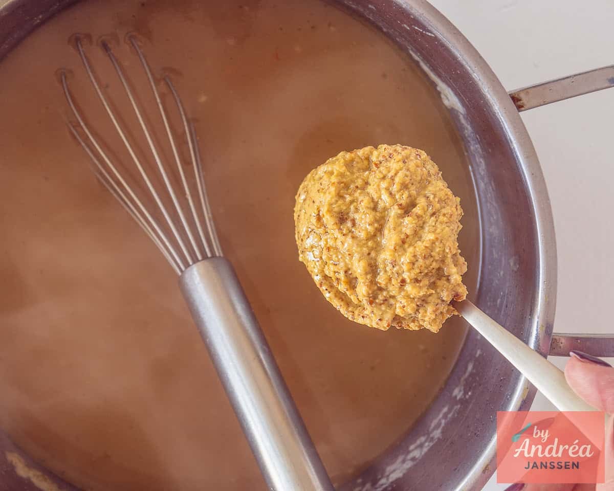 Stir mustard into the broth