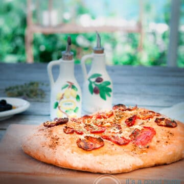 Focaccia with tomato, Italian herbs and Parmesan