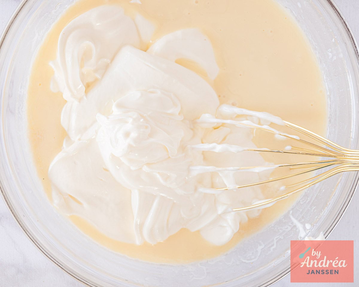 Whisk the Greek yogurt into the condensed milk mixture.