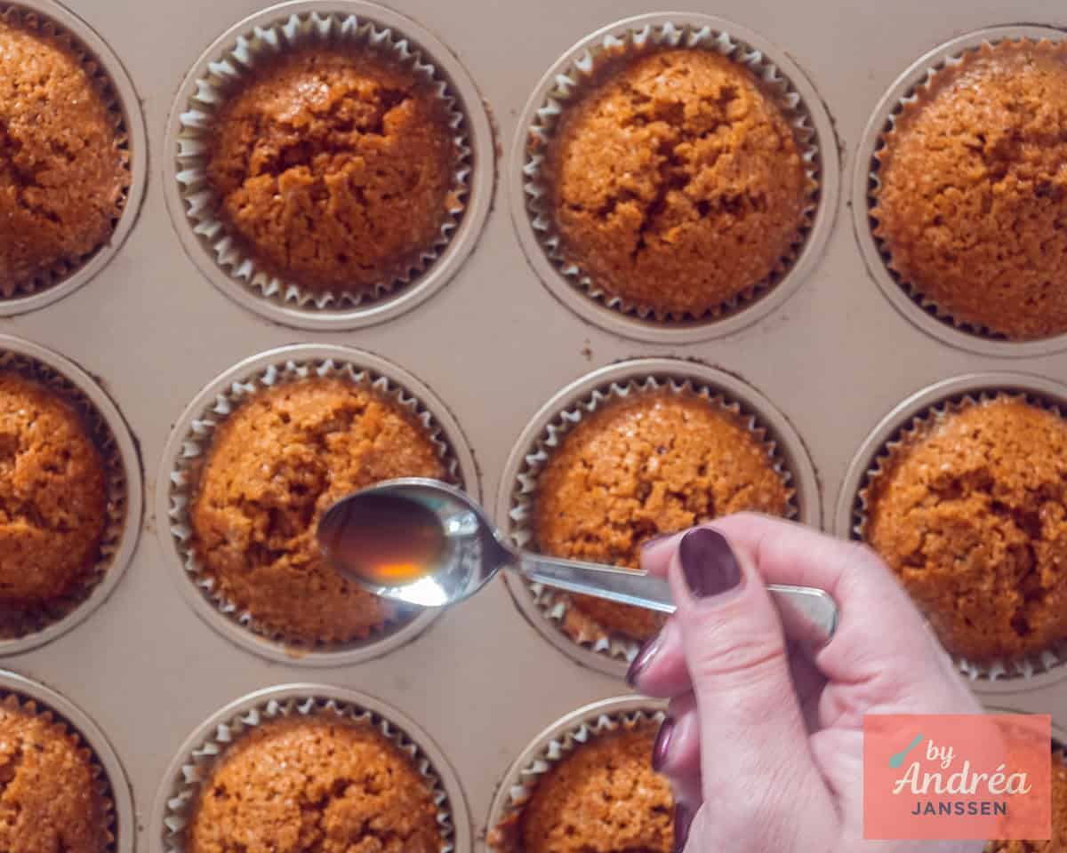 Adding coffee syrup to the cupcakes