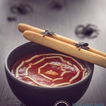 Creamy tomato soup with meatballs for Halloween