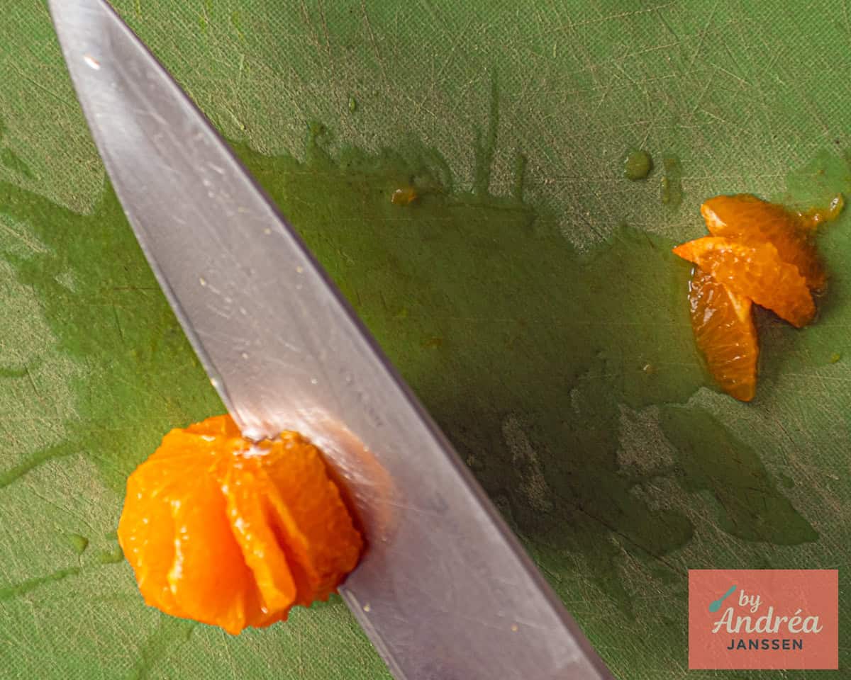Tangerine segments are cut out.