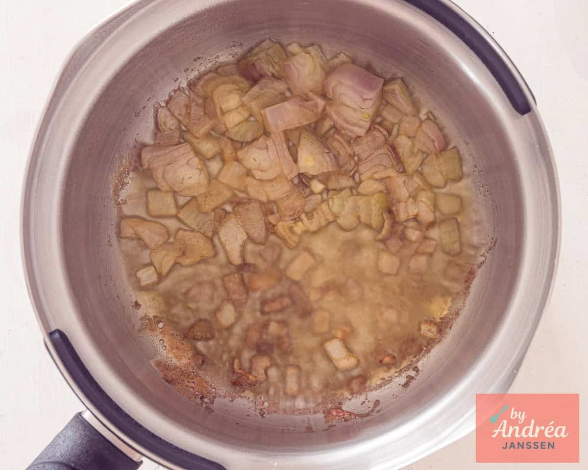 Melt the butter with the onion and garlic in a small pan.