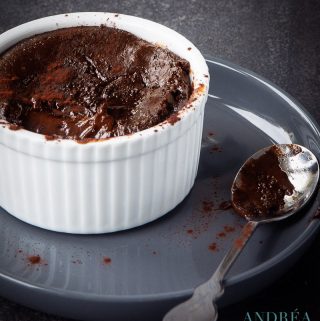 a ramekin with a chocolate pudding with a liquid heart