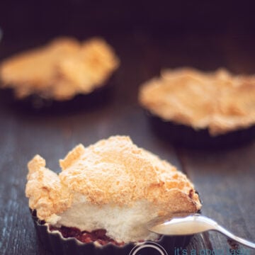 three quiche forms filled with sweet rhubarb stew and topped with a caramelized foam.