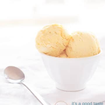 a white bowl with three scoops of Cognac ice cream and a spoon