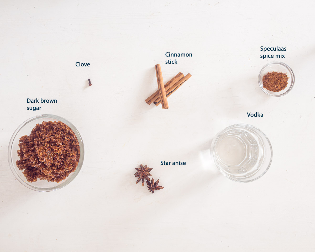 Dark brown sugar, vodka, cinnamon sticks, star anise, clove, and speculaas spice mix for homemade spiced liqueur
