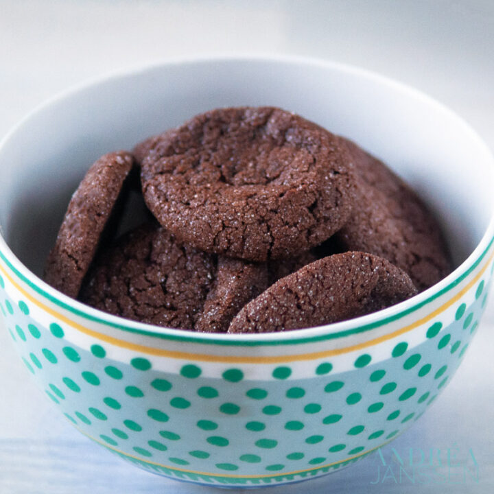 a bowl filled with chocolate cookies