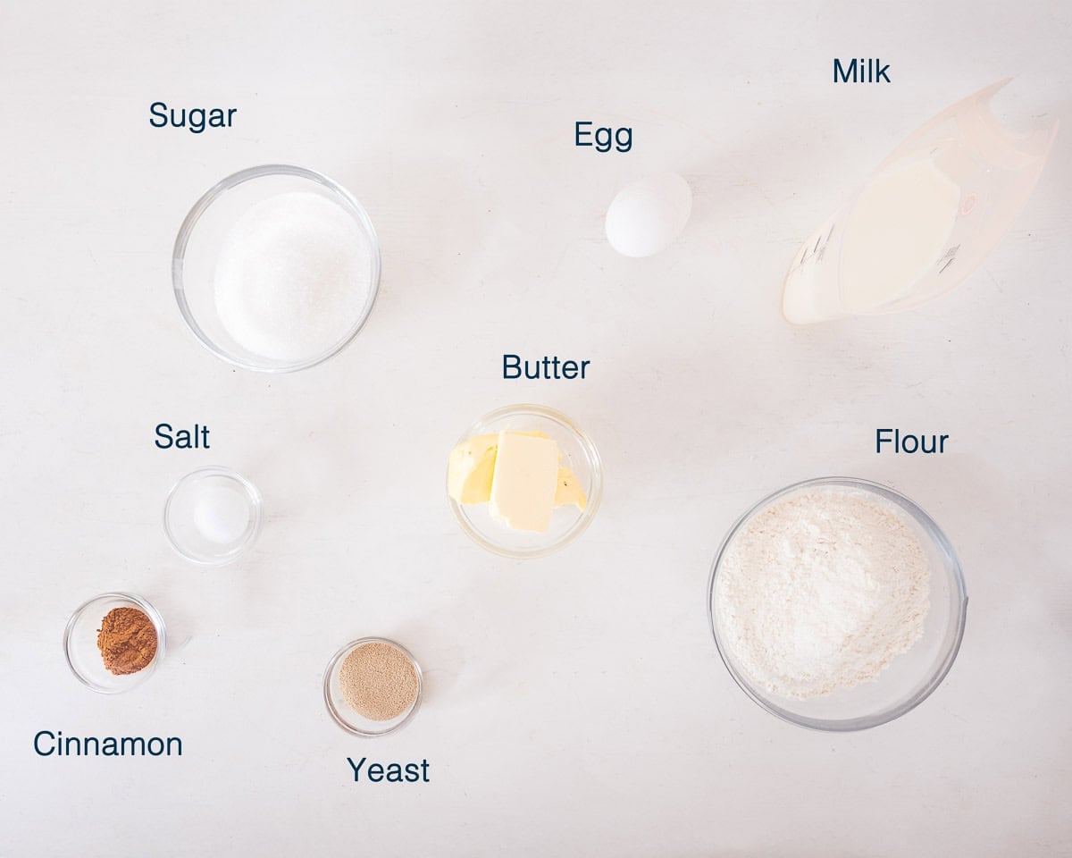 Ingredients Cinnamon Wreath Bread Recipe for the Holidays on a white background with text description.