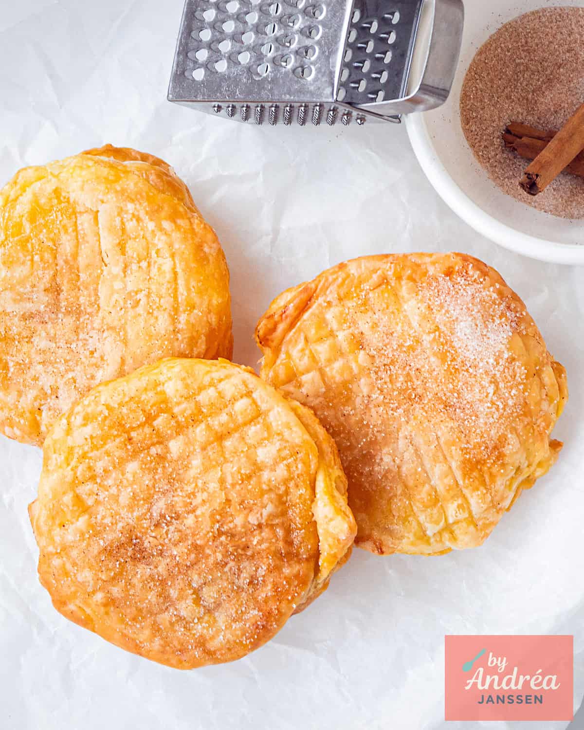 Air fryer appelbeignets made with puff pastry, coated in cinnamon sugar