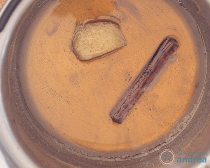 Allow the stewed pear liquid to reduce further in a saucepan