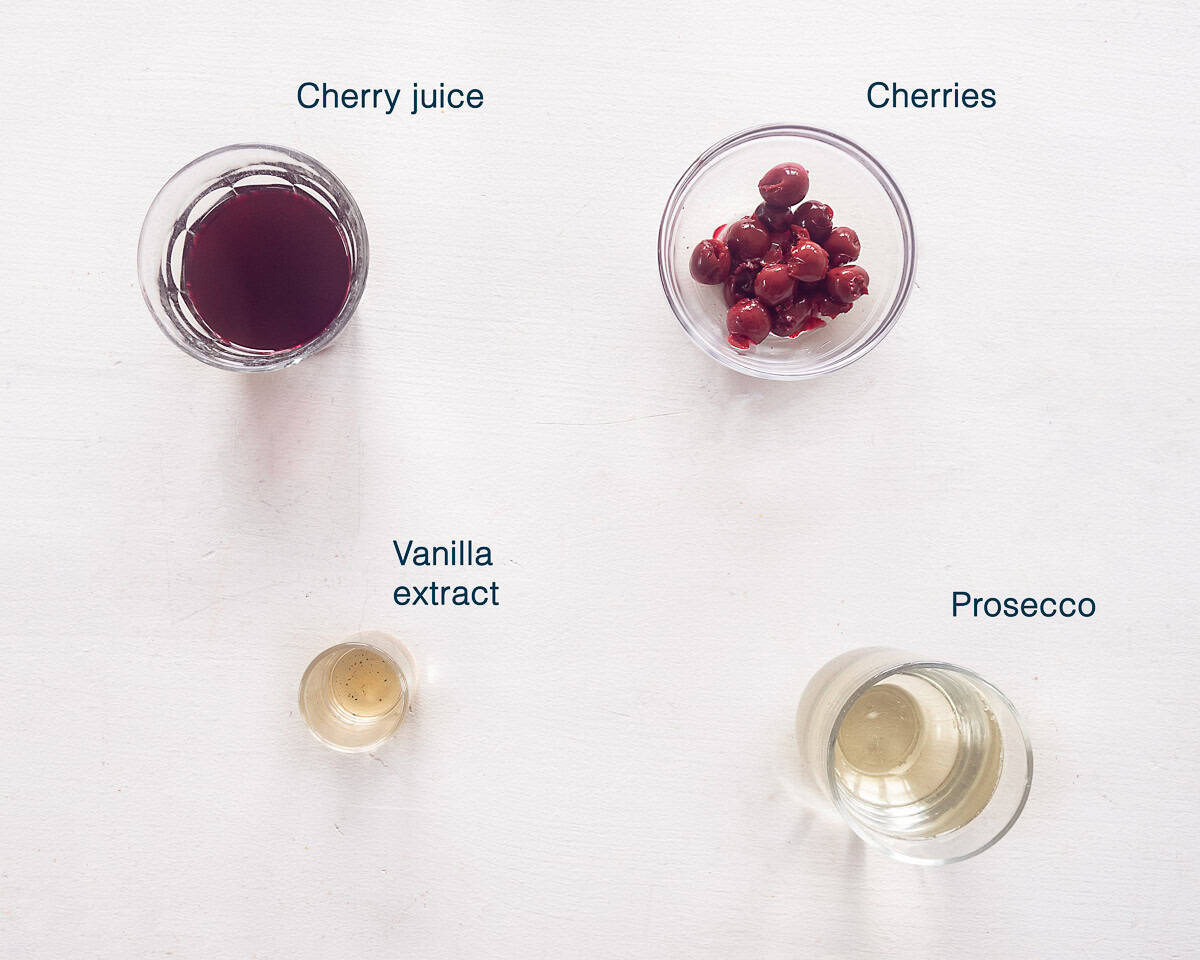 Ingredients Valentines Cocktail with Cherries and Prosecco on a white background with a text description