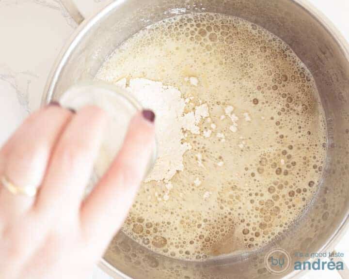The flour is stirred into the melted butter at once