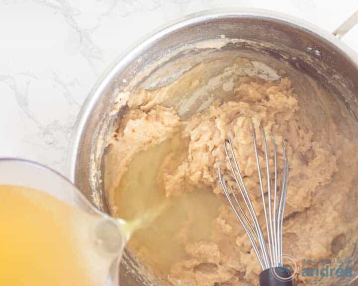 The roux is diluted with chicken stock